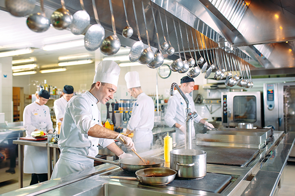 Modern kitchen. The chefs prepare meals